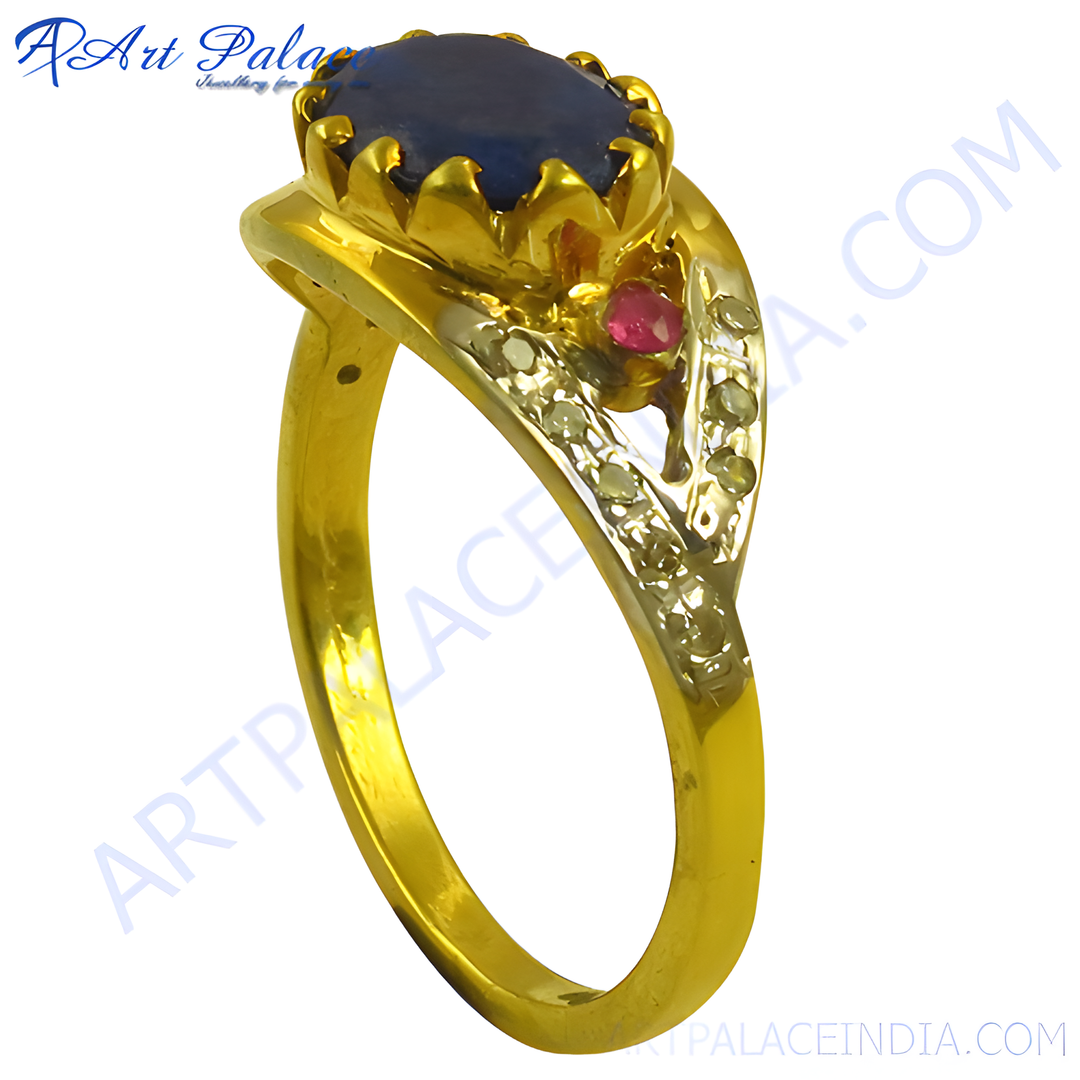 gold plating ring with a large blue sapphire gemstone and a small red ruby, a luxurious and eye-catching piece of jewelry.