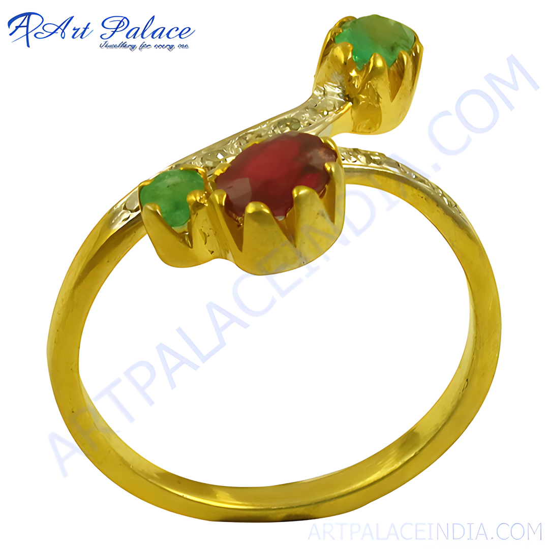 gold plating ring featuring a ruby gemstone and two emerald gemstones, a vibrant piece of jewelry.