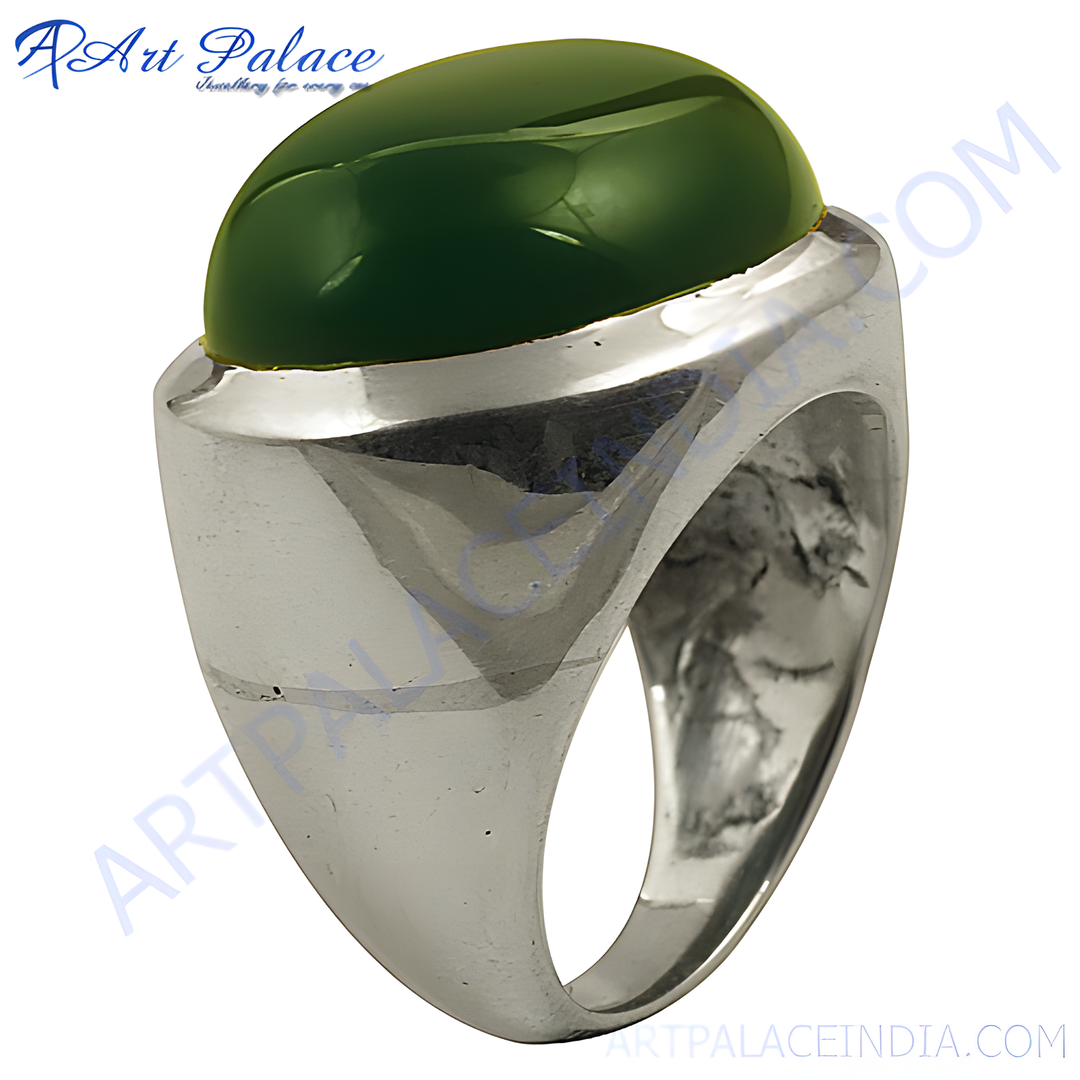 Silver cocktail ring with a large, polished green gemstone. The ring is made of silver and features a modern design.