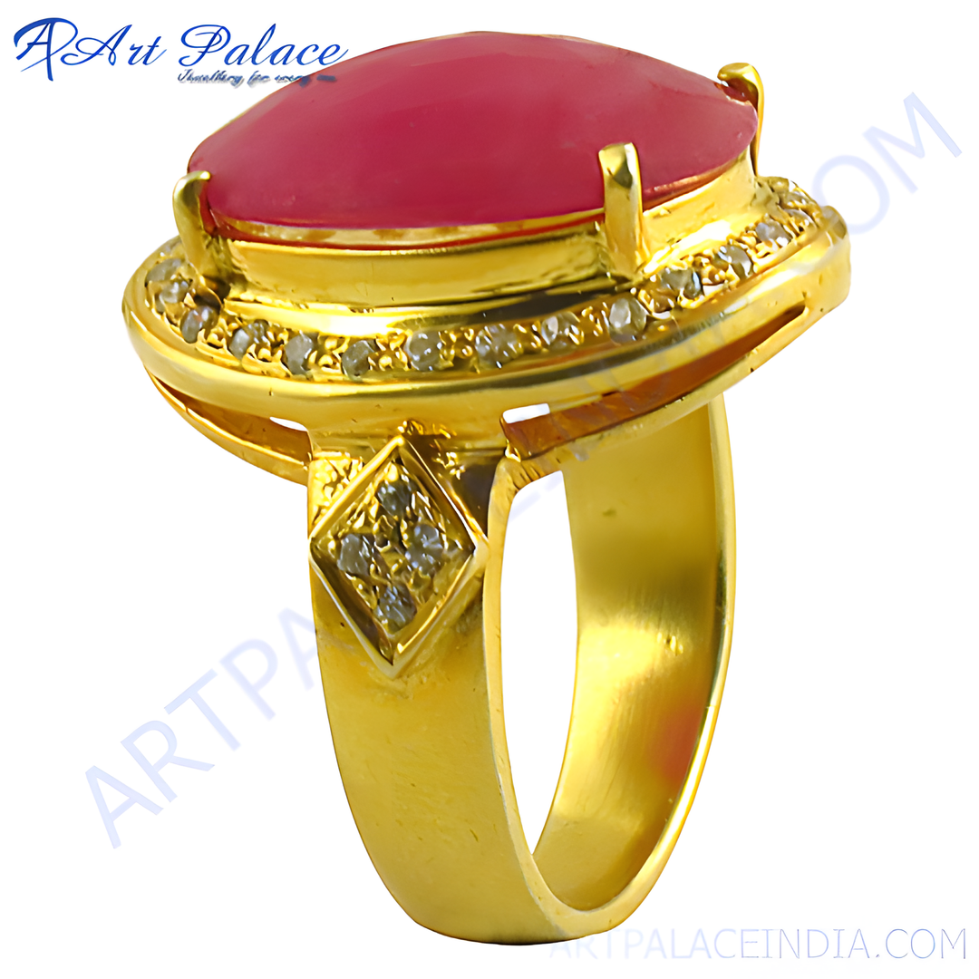 gold plating ring with a large oval-cut ruby gemstone and diamond accents, a beautiful piece of jewelry.