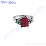 Load image into Gallery viewer, Silver ring with a large rectangular ruby gemstone and accent stones, perfect as a gift.
