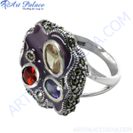 Load image into Gallery viewer, 925 sterling silver multi-gemstone cocktail ring with purple enamel and accent stones.
