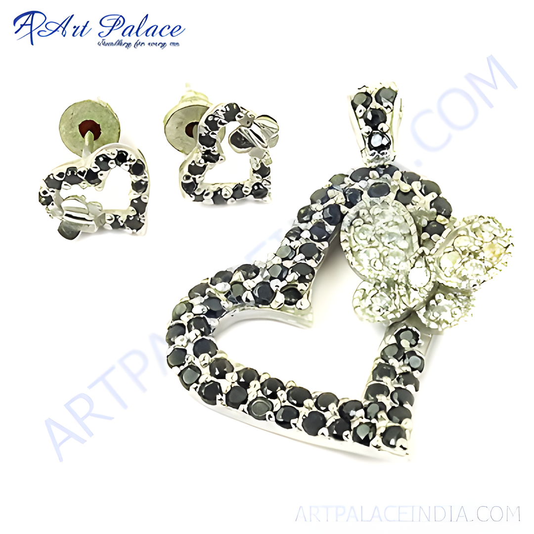 Sterling silver heart pendant and matching earrings set with black gemstones, ideal for women's fashion jewelry.