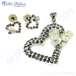 Load image into Gallery viewer, Sterling silver heart pendant and matching earrings set with black gemstones, ideal for women's fashion jewelry.
