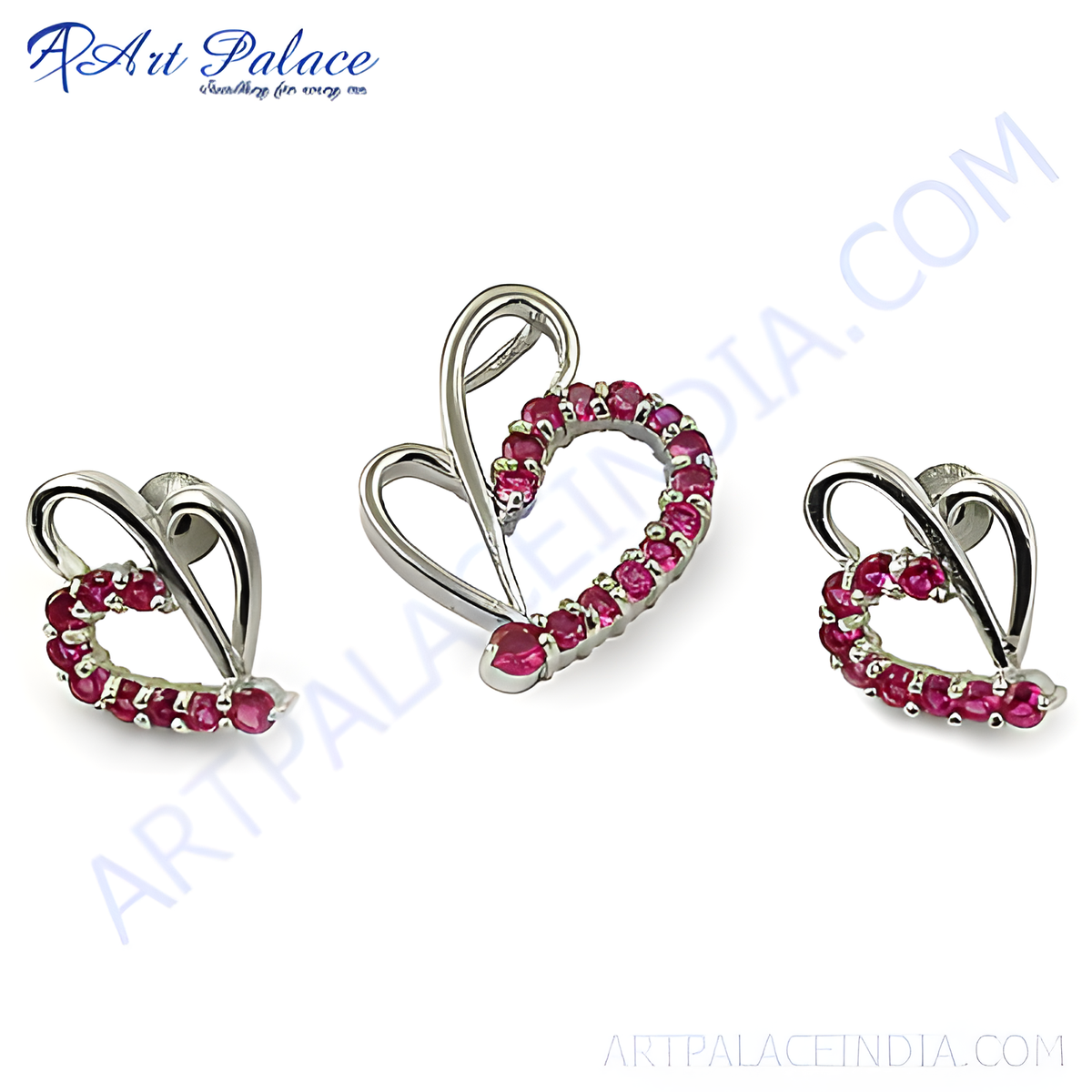 Sterling silver heart shaped jewelry set with ruby gemstones, a pendant and earrings