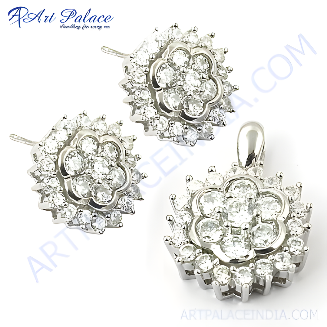 Silver flower earrings and pendant set with sparkling cubic zirconia gemstones, perfect for any occasion.