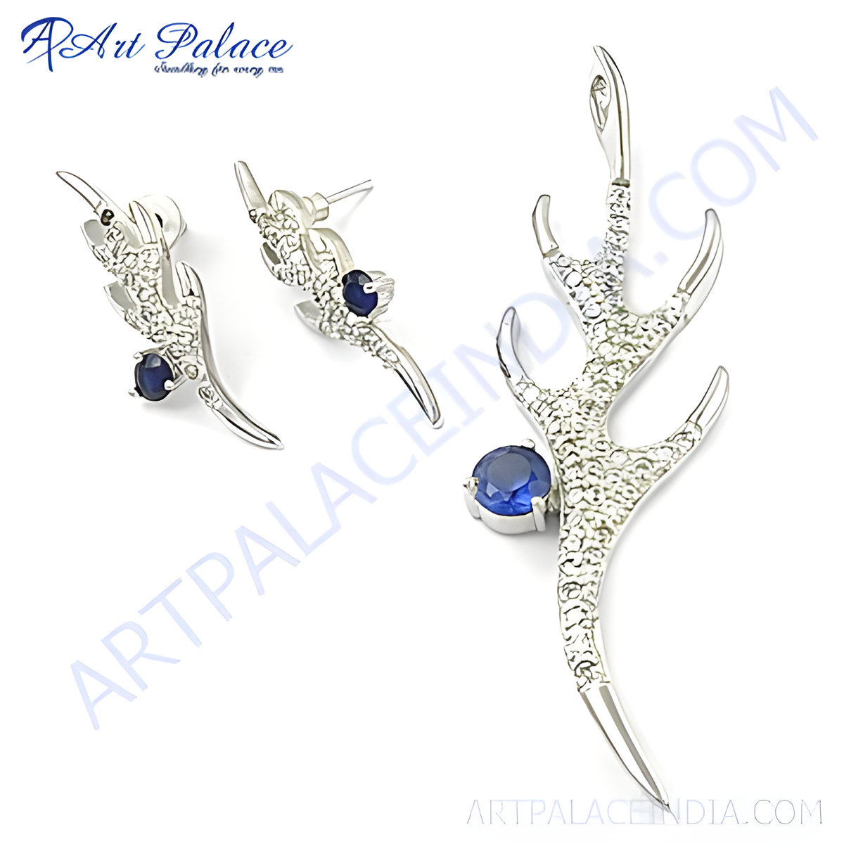 Sterling silver earrings and pendant set featuring blue sapphire gemstones in a unique claw design