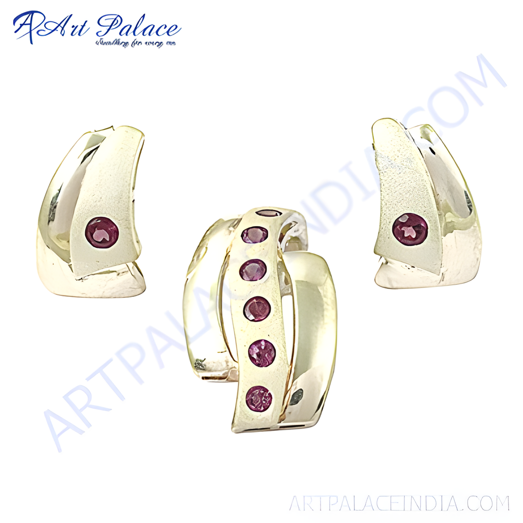 Silver hoop earrings with pink gemstones. Featuring a unique design. Perfect for everyday wear or gifting.