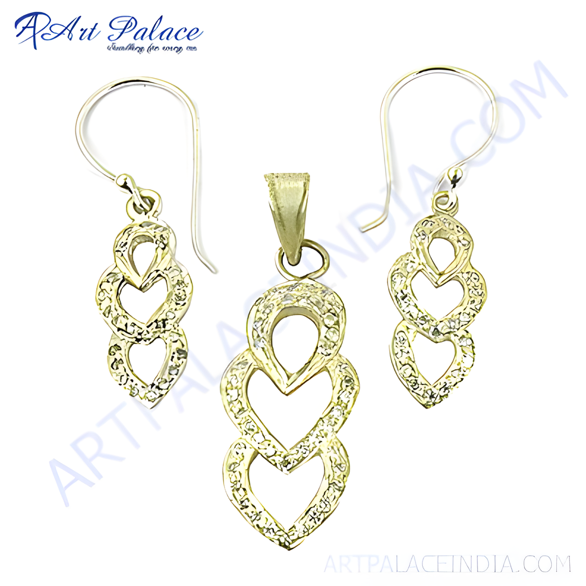 Gold plating pendant and earrings set with crystal heart design on white background