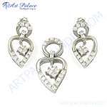 Load image into Gallery viewer, Sterling silver pendant and earring set featuring heart-shaped design and diamond accents for women.
