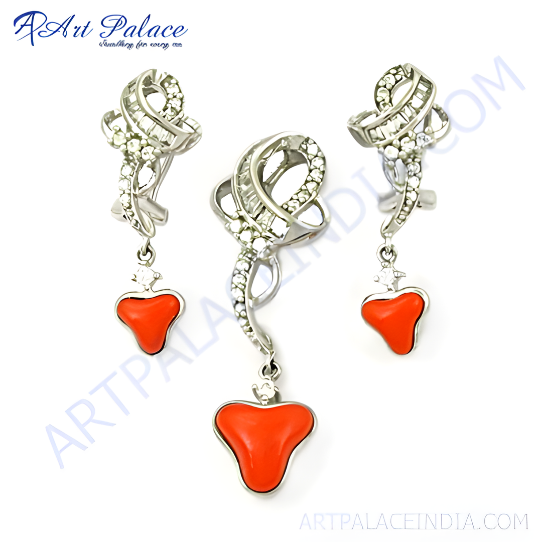 Silver dangle earrings set featuring vibrant red coral gemstones. Elegant design for women.