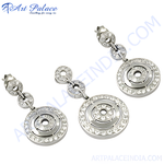Load image into Gallery viewer, Silver dangle earrings with sparkling crystals. Features a three-circle design and posts for pierced ears. The earrings are made of silver.
