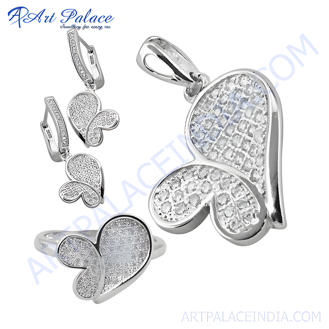 Sterling silver butterfly jewelry set including earrings, pendant, and ring with clear cubic zirconia stones.