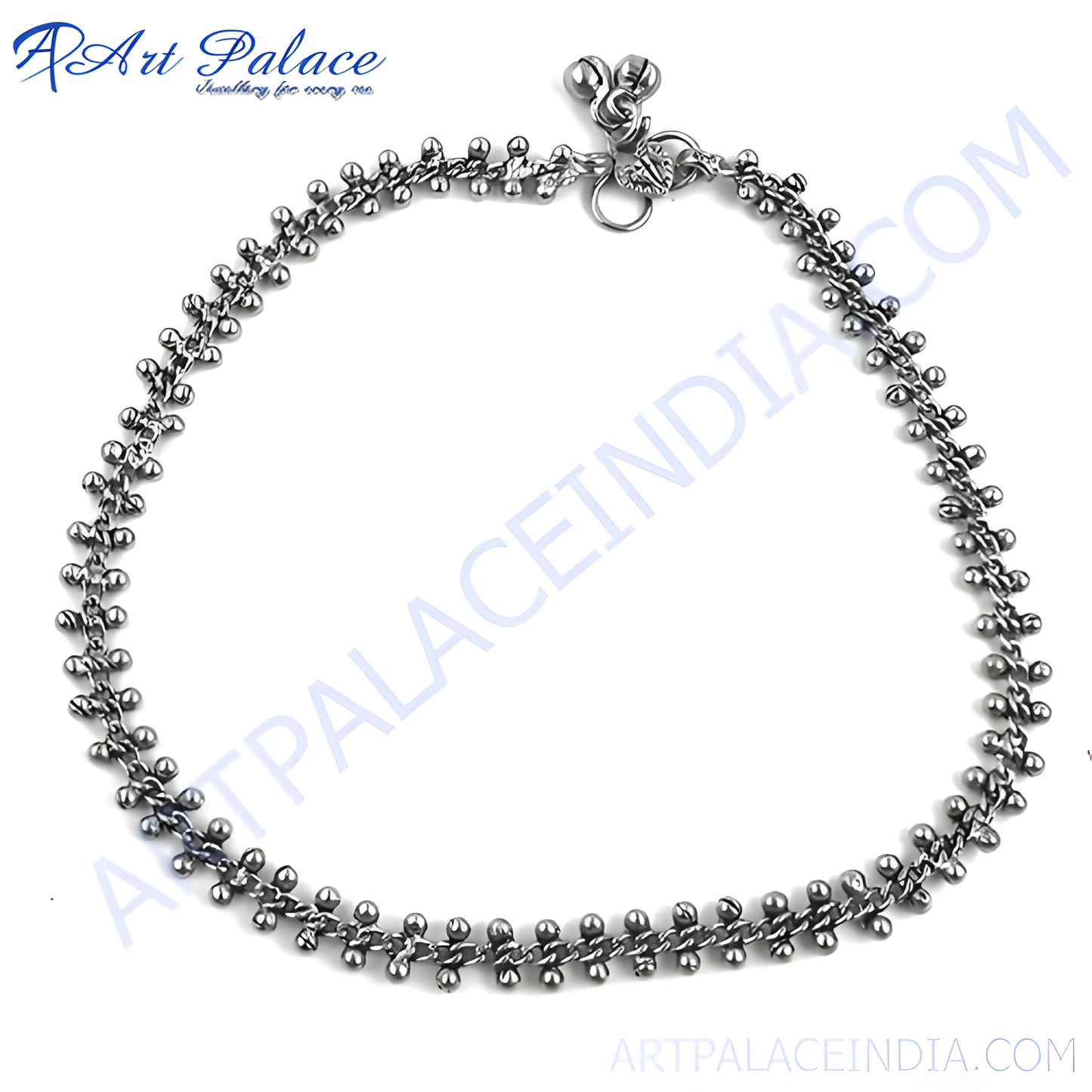 Oxidized silver chain anklet with beaded accents and bell charms, perfect for a bohemian look.