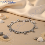 Load image into Gallery viewer, 925 sterling silver anklet with delicate chain and dangling bells, a perfect piece of Indian bridal jewelry.

