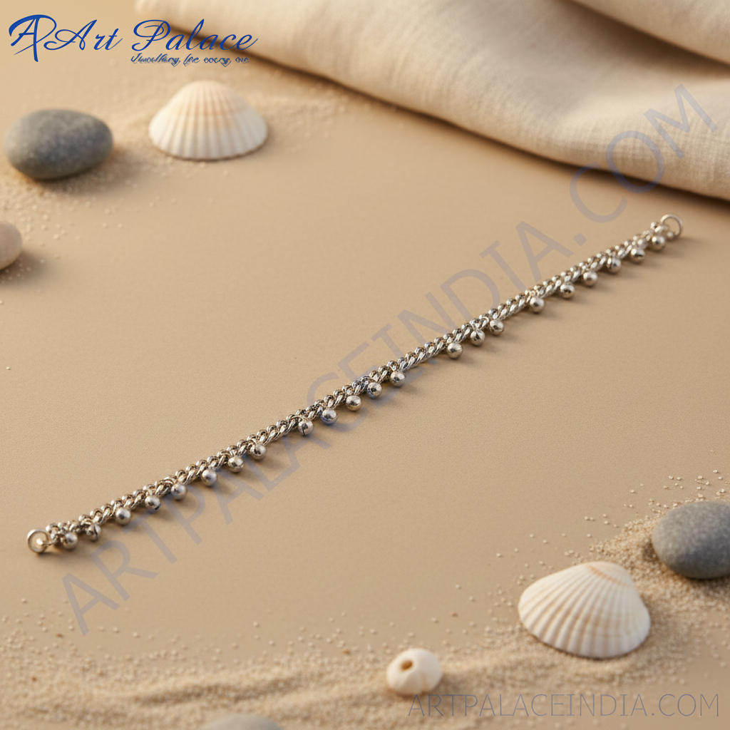 Silver anklet with small decorative beads, delicate chain design for women's feet.