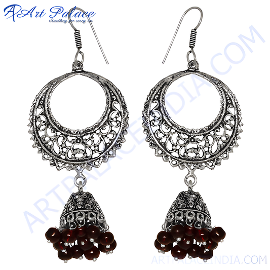 Silver filigree drop earrings with intricate detailing and red bead accents for women.