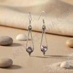 Load image into Gallery viewer, 925 sterling silver teardrop earrings with a round pink gemstone set in the center. Dangle design for women.
