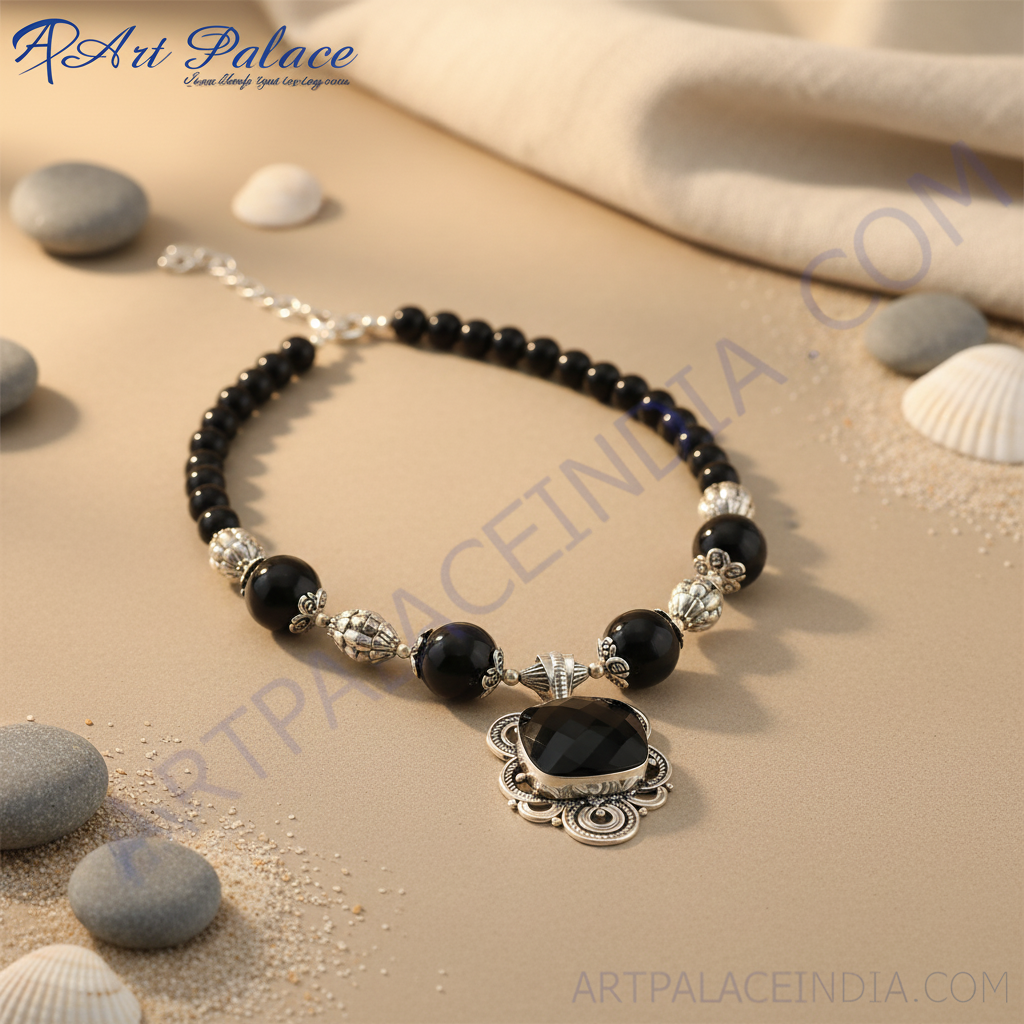 Black onyx bead necklace with a silver pendant, featuring a square cut black stone