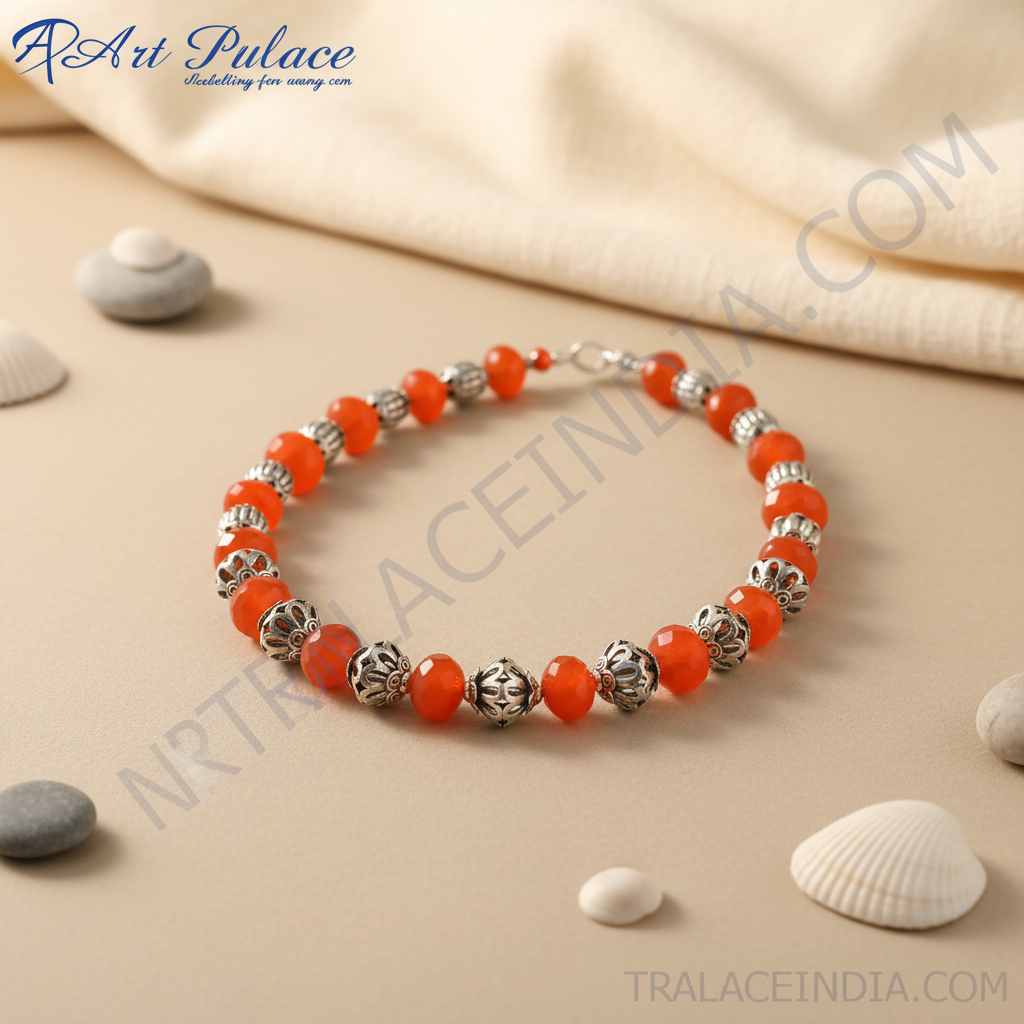 Red carnelian bead necklace with sterling silver accents on a black display