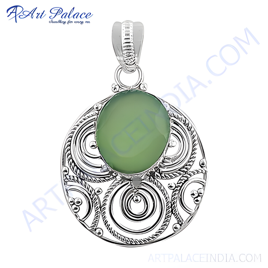 925 sterling silver pendant with a green chalcedony oval gemstone. A detailed filigree design.