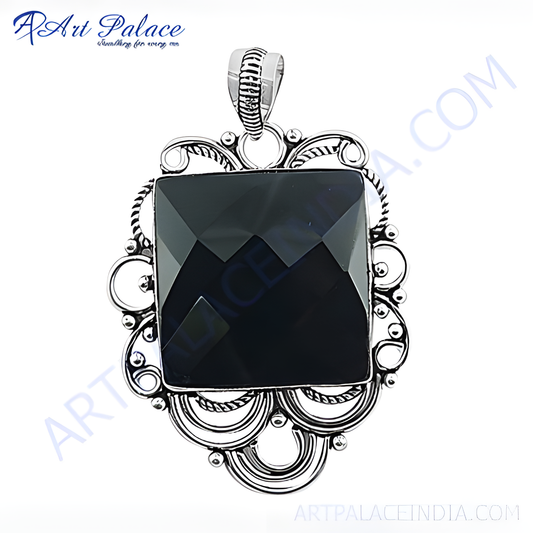 925 sterling silver pendant with a large, square black onyx gemstone. Elegant silver filigree detail.