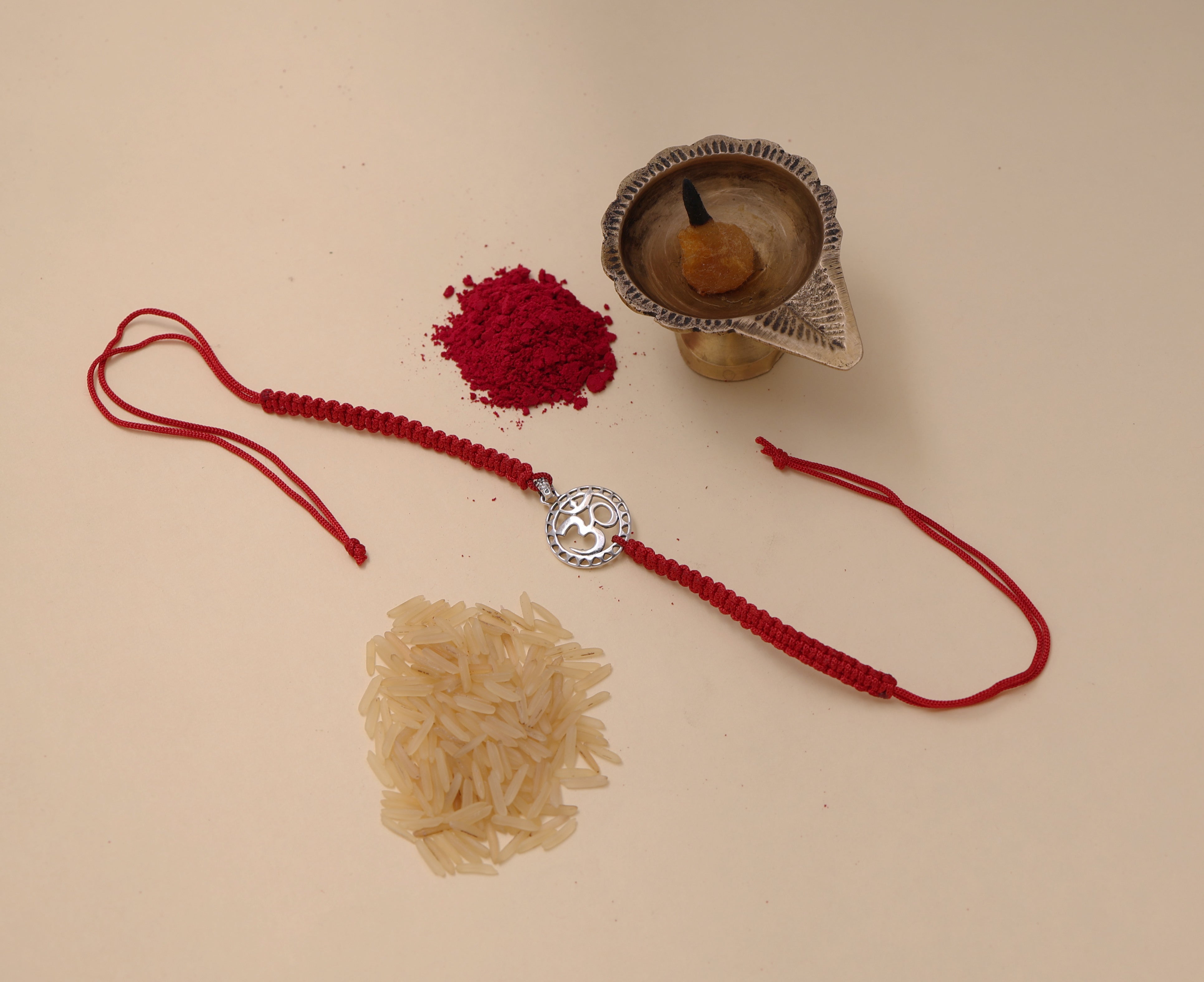 Sterling Silver Om Rakhi Bracelet for Brother with CZ Stones