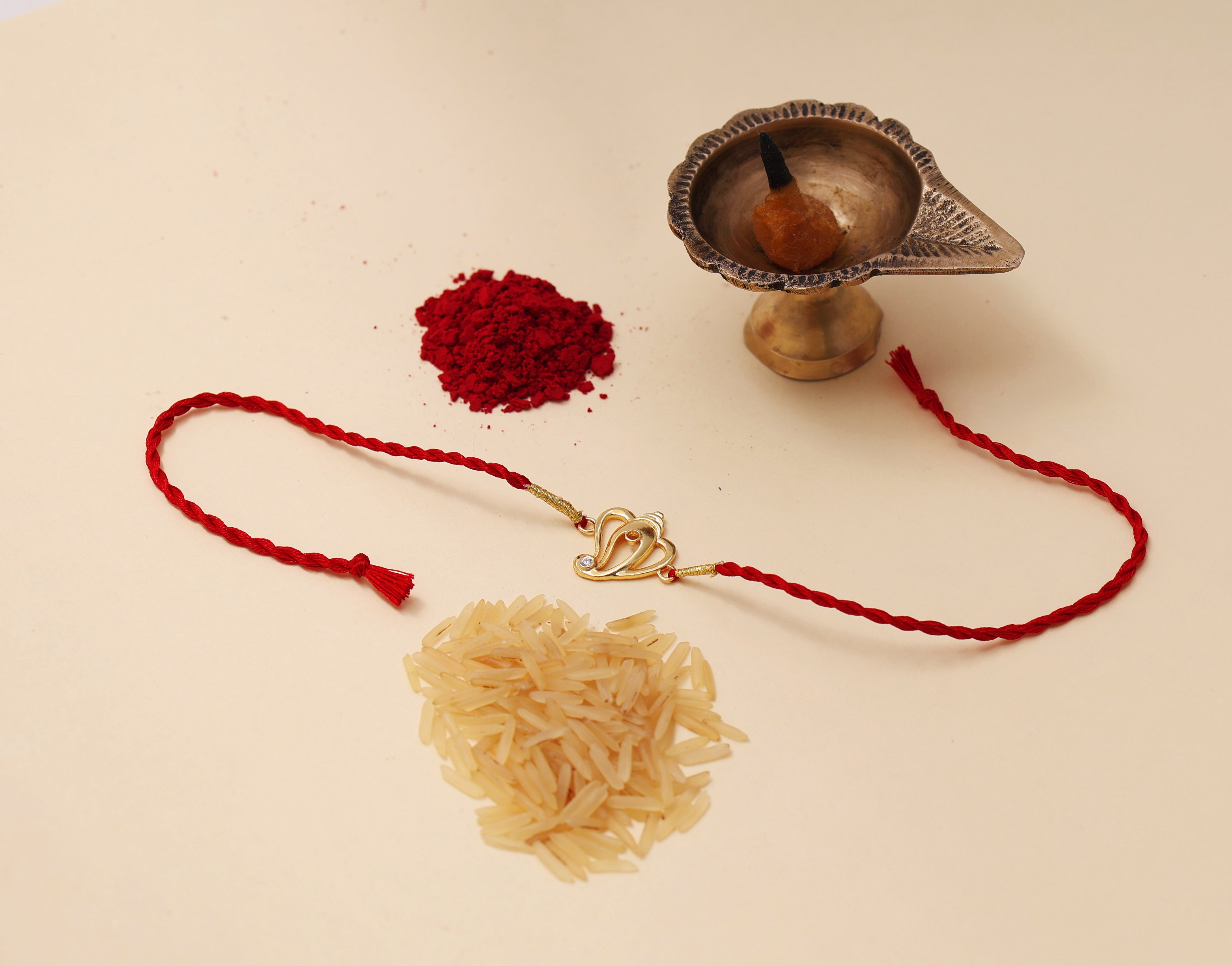 Gold Plated 925 Silver Ganesha Rakhi with CZ for Brother