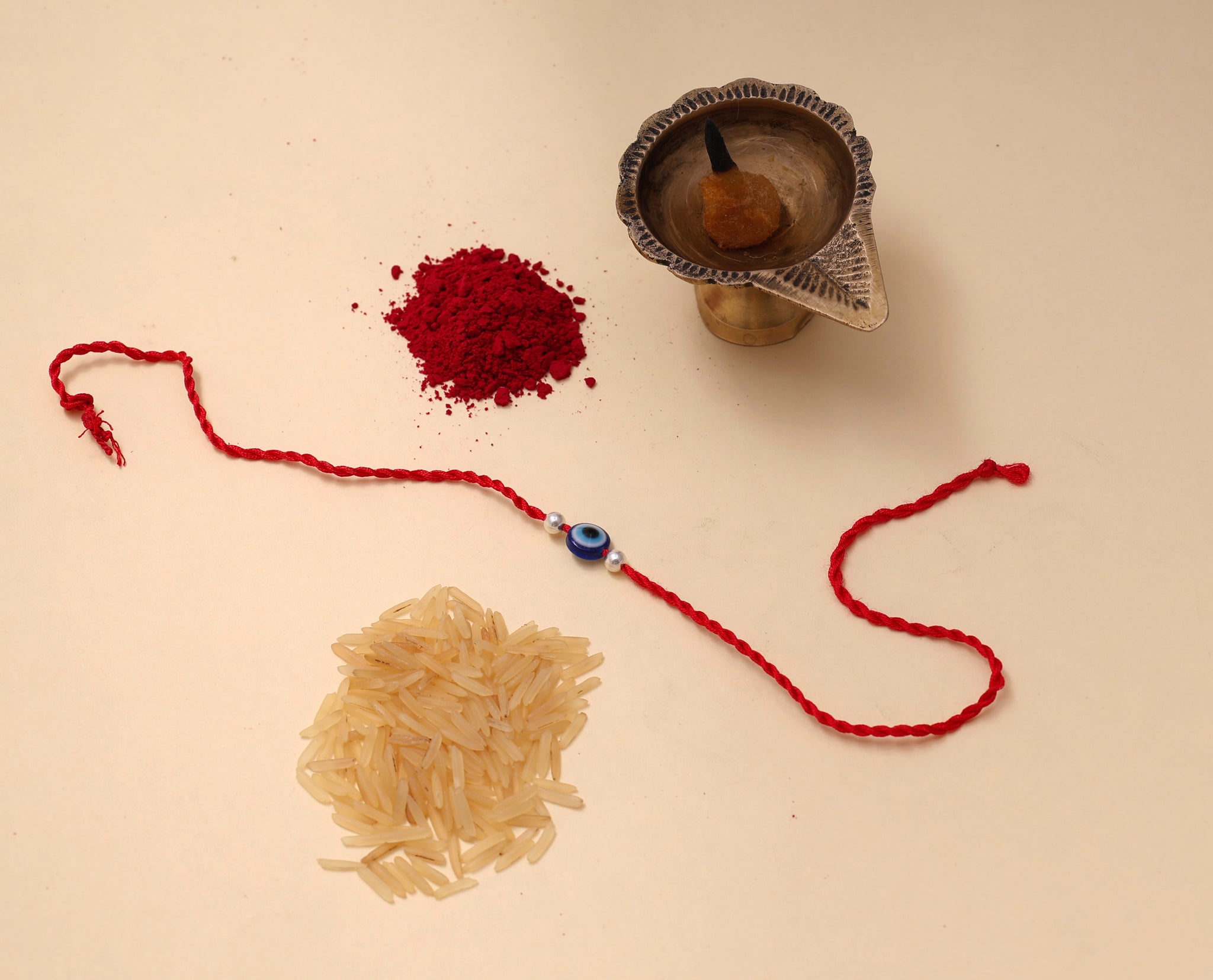 Evil Eye Rakhi for Brother in 925 Sterling Silver | Red Thread