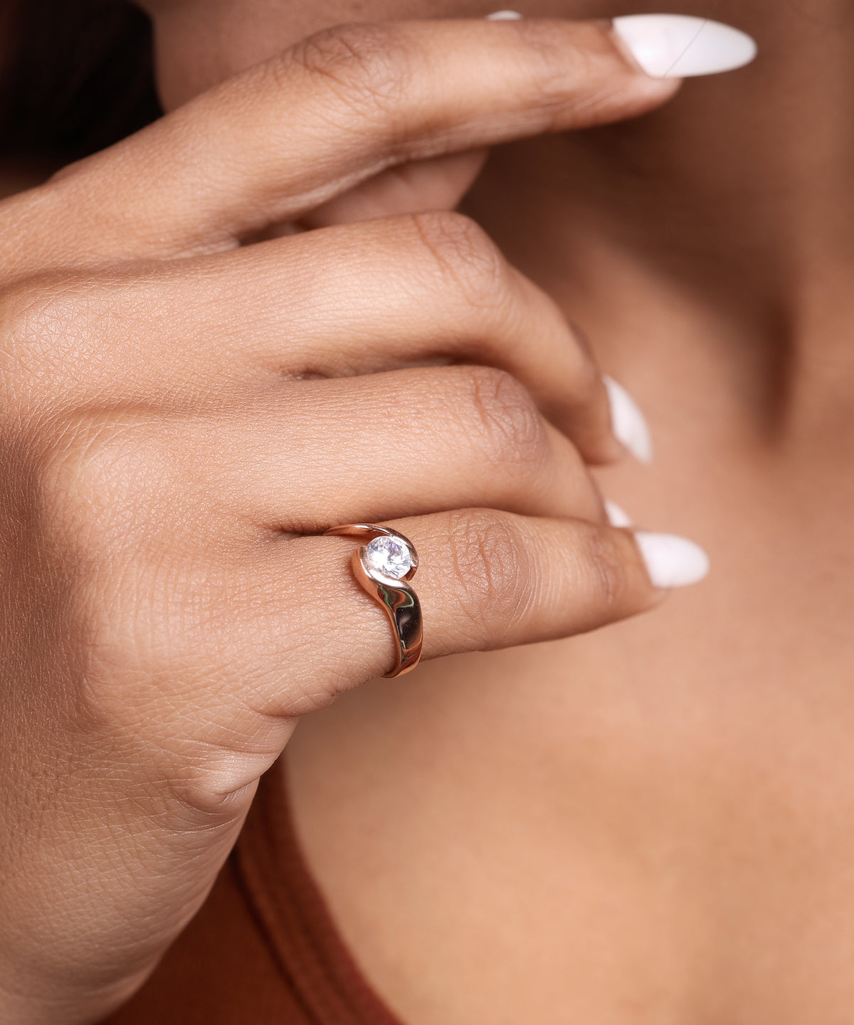 Rose gold plated solitaire ring with white cubic zirconia stone for women