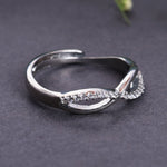 Load image into Gallery viewer, 925 Sterling Silver Infinity Bypass Ring with Clear Stones

